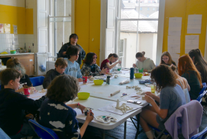 Young people taking part in a Little Red Kettle Culture Club art workshop in Waterford