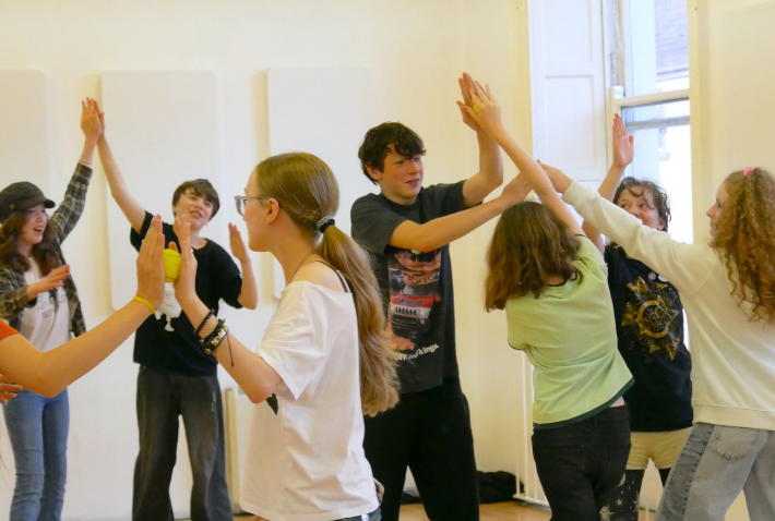 Children taking part in a creative movement activity at Little Red Kettle in Waterford.